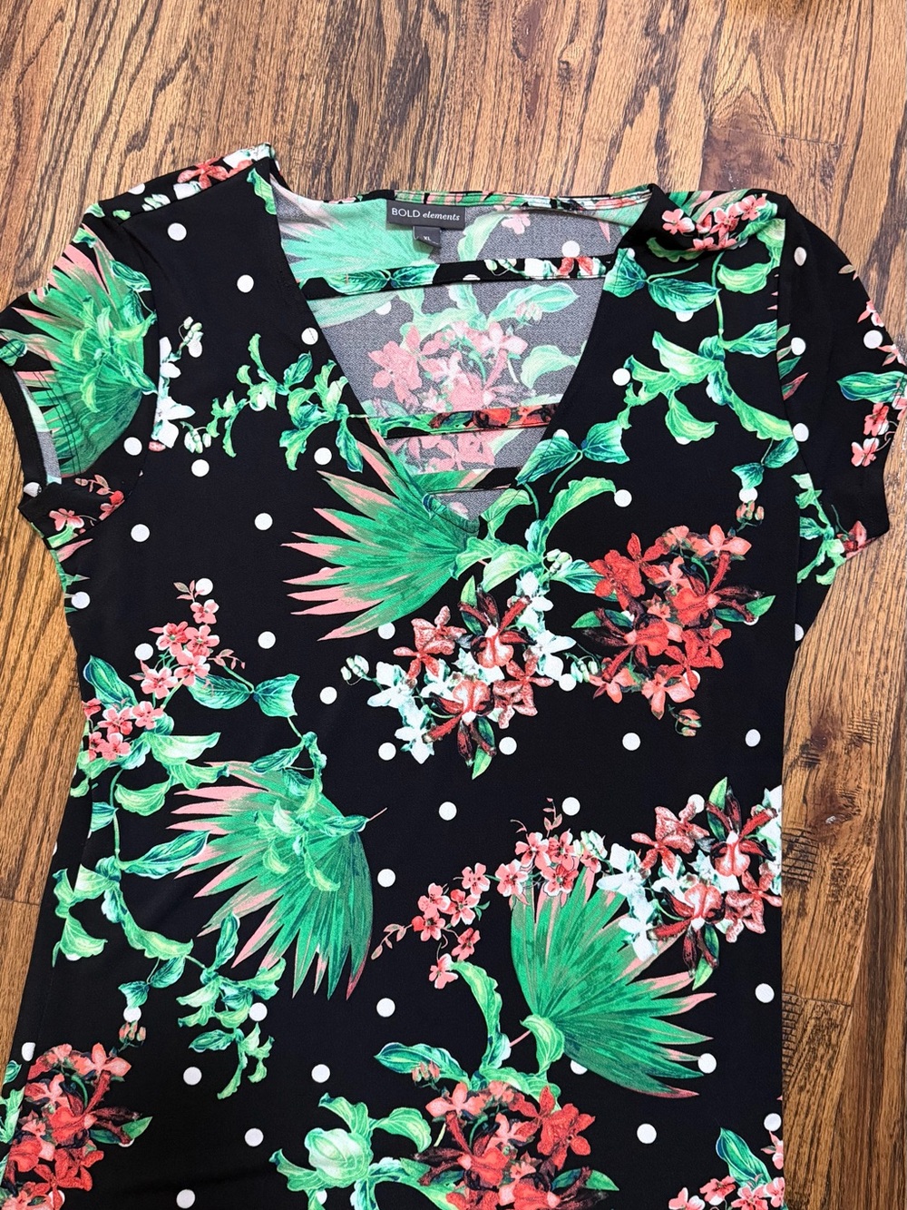 BOLD elements Black Floral V-Neck Short Sleeve Top with Green and Coral Print